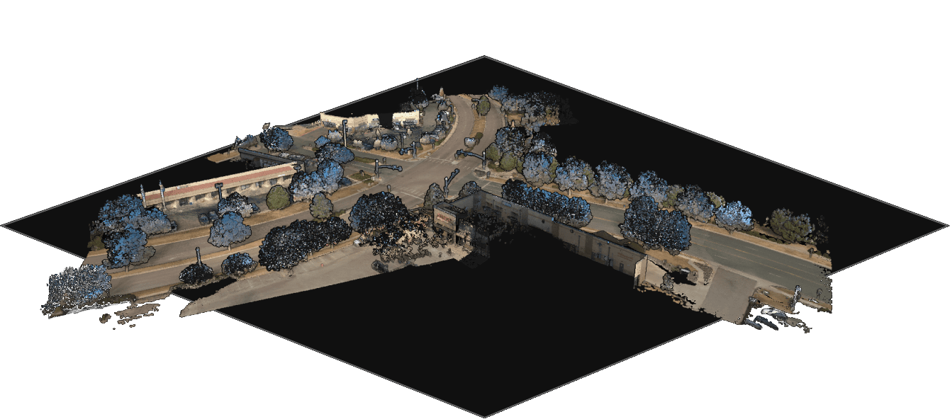 Raw colorized point cloud of a road intersection with trees and buildings, shown on an isometric sheet