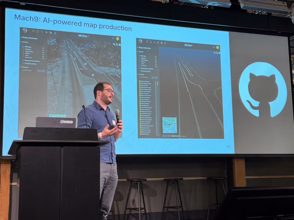 A Mach9 engineer presenting AI-powered map production on stage